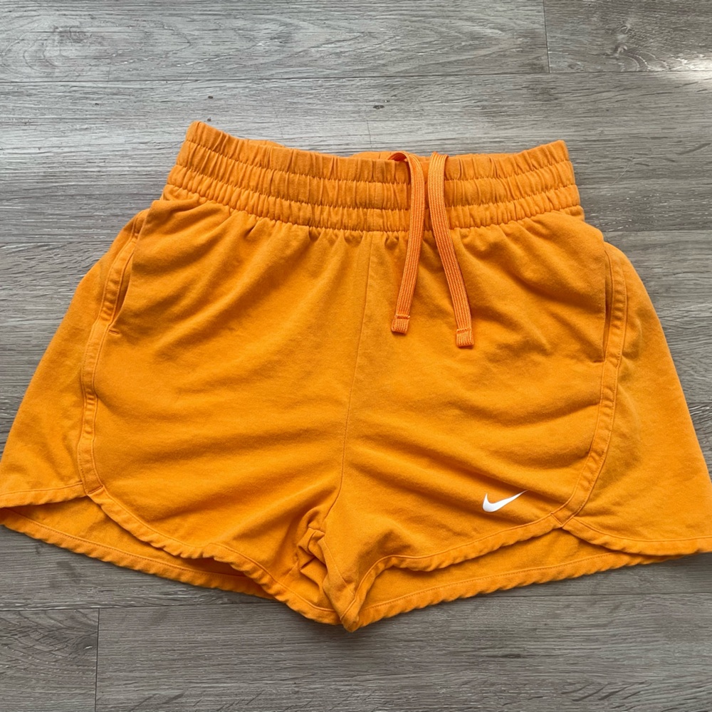 Orange nike shorts